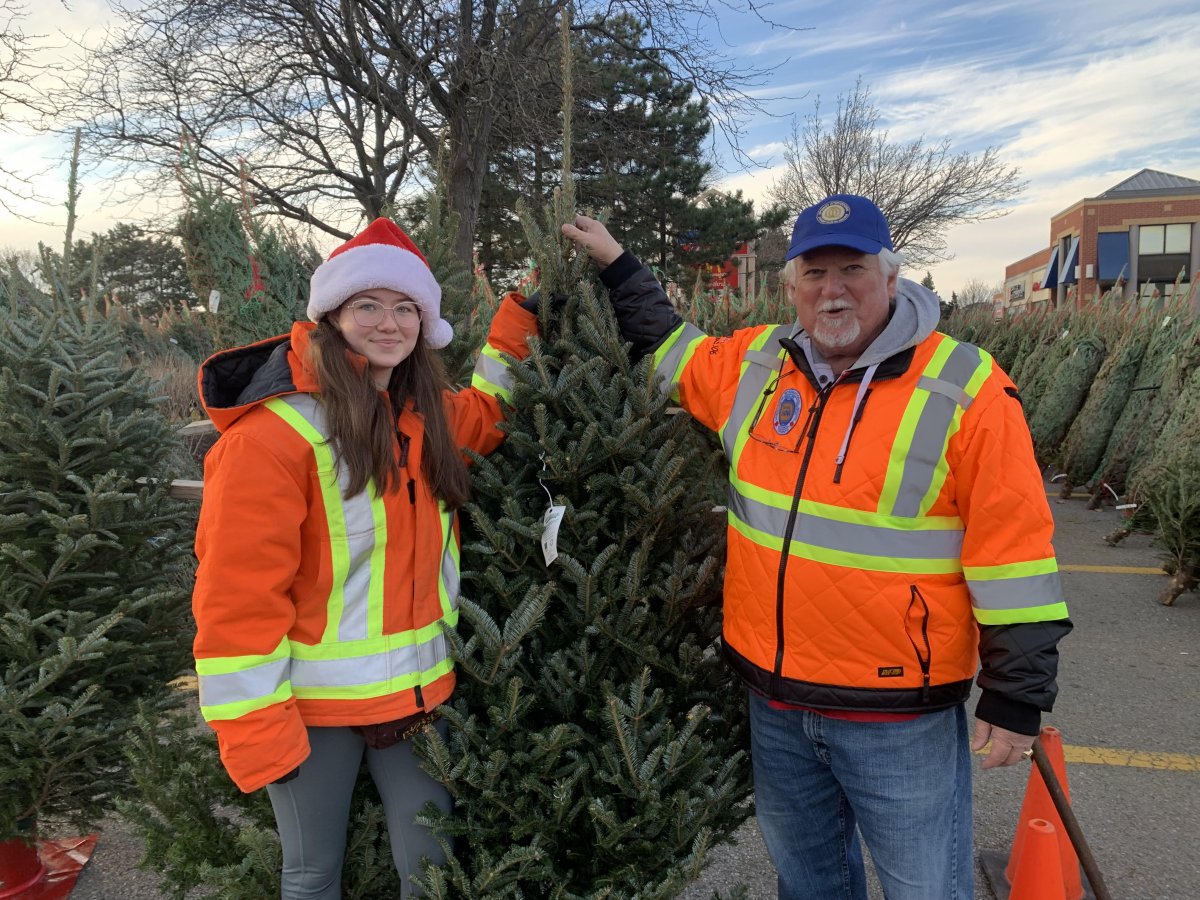 Our Junior Optimist President, Shelby and our Oakville Optimist Club President Rob at the Christmas Tree Lot
