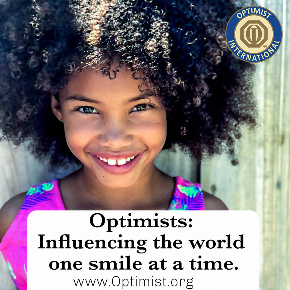 A photo of a smiling little girl and these words: Optimists: Influencing the world one smile at a time.